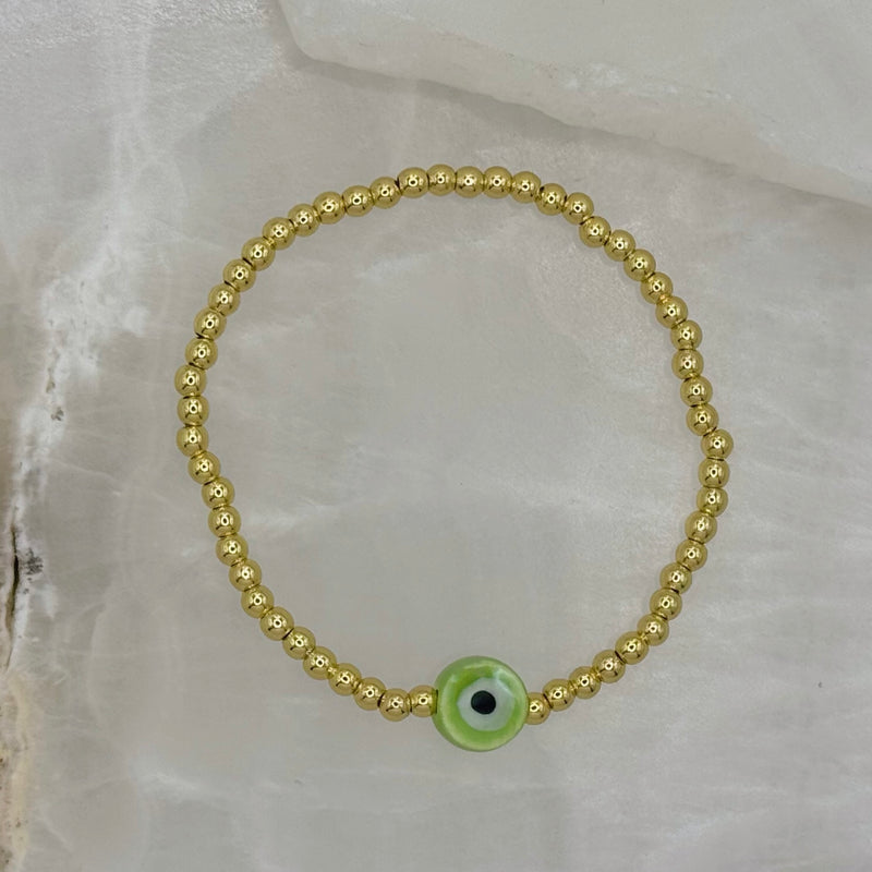 KIDS GREEN EYE GOLD BEADED bracelet