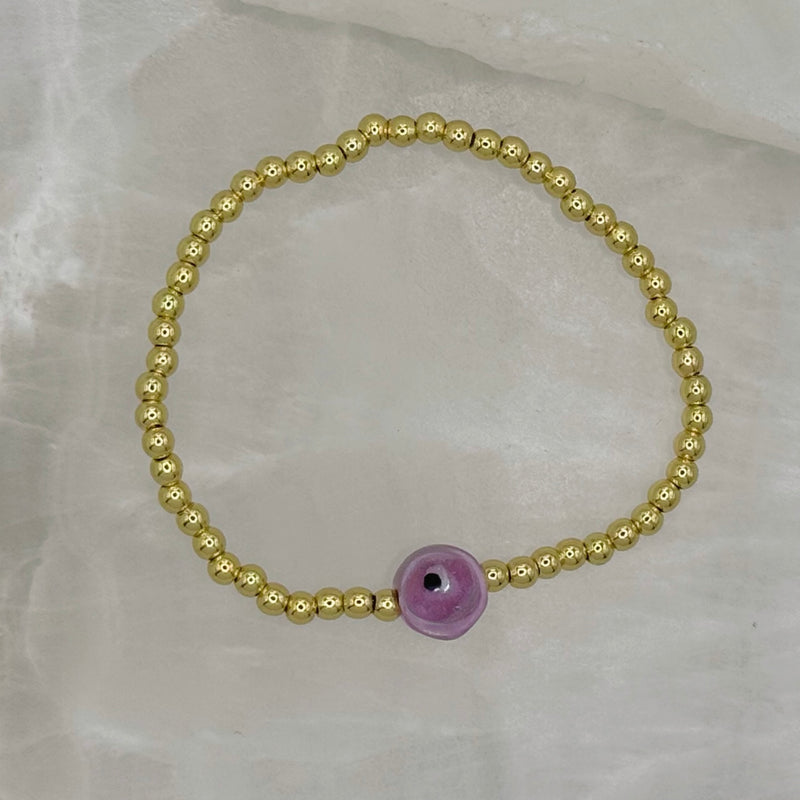 KIDS PURPLE EYE GOLD BEADED bracelet