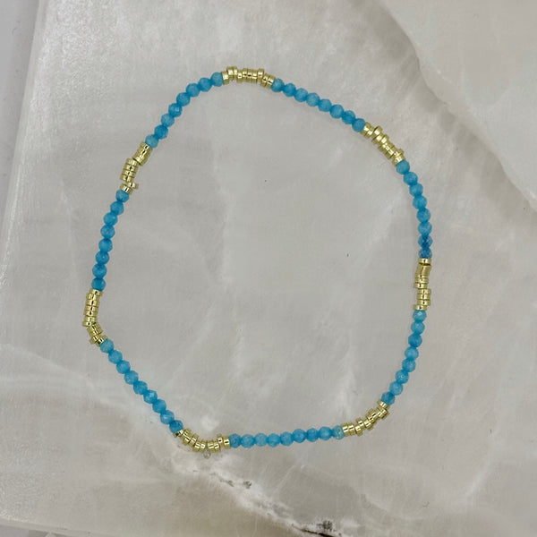 DIAMOND CUT BLUE & GOLD BEADED STRETCHY bracelet