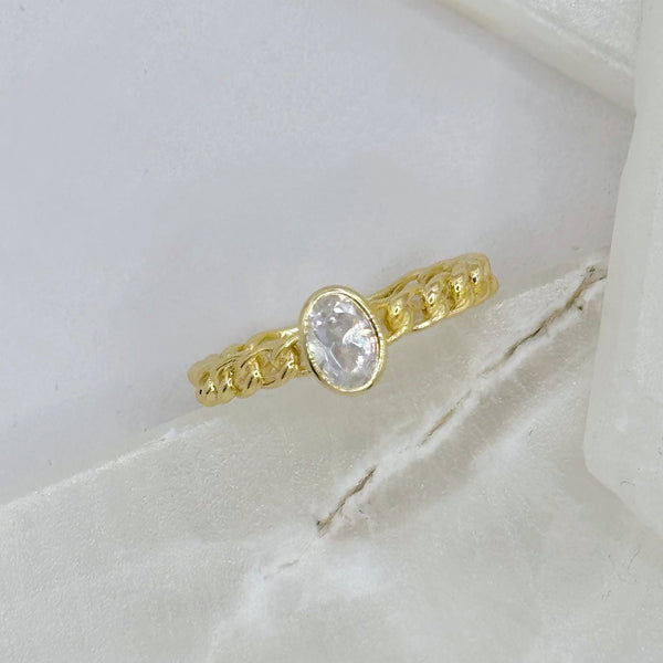 GOLD OVAL CRYSTAL BEZEL CUBAN ring